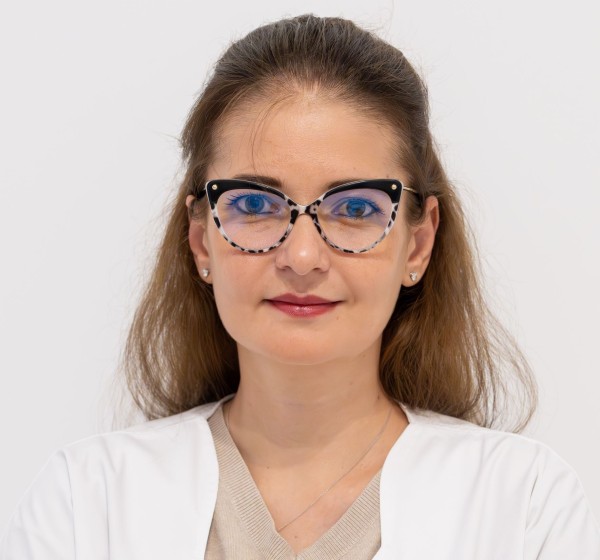 Dr. Haradja Elena Flavia